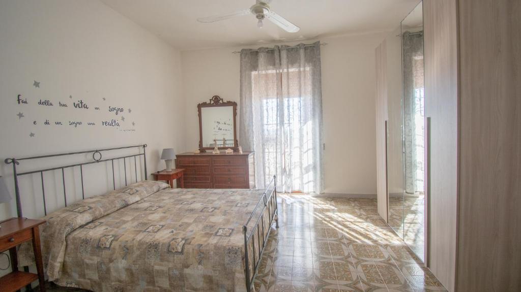 Кровать или кровати в номере VILLA SALINA MONACI