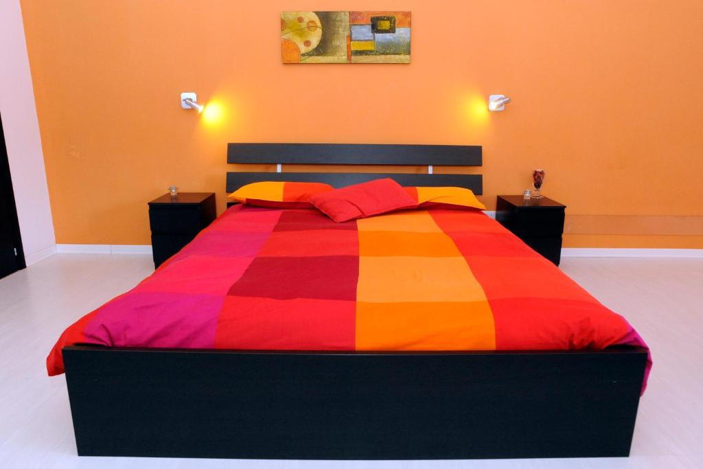 Postel nebo postele na pokoji v ubytování Magic Rainbow