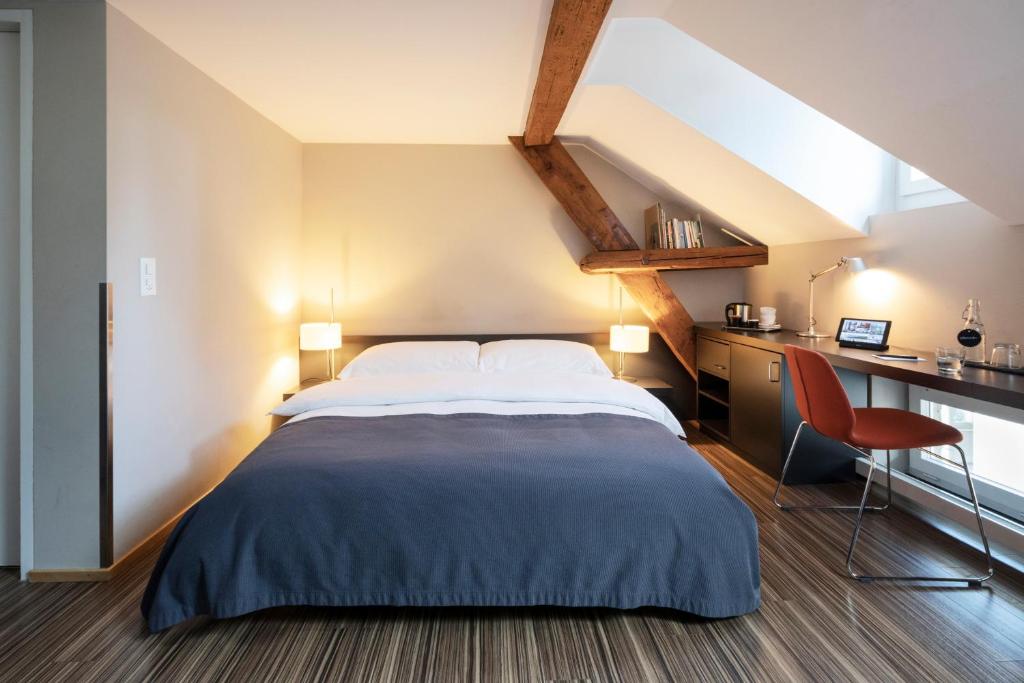 Llit o llits en una habitació de Altstadt Hotel