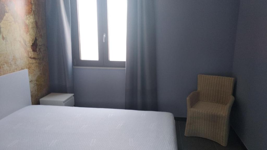 Postel nebo postele na pokoji v ubytování B&B Vecchia Darsena