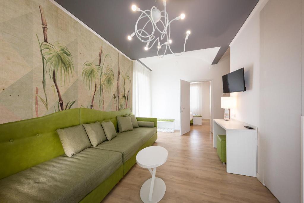 TV a/nebo společenská místnost v ubytování Park Hotel Pineta