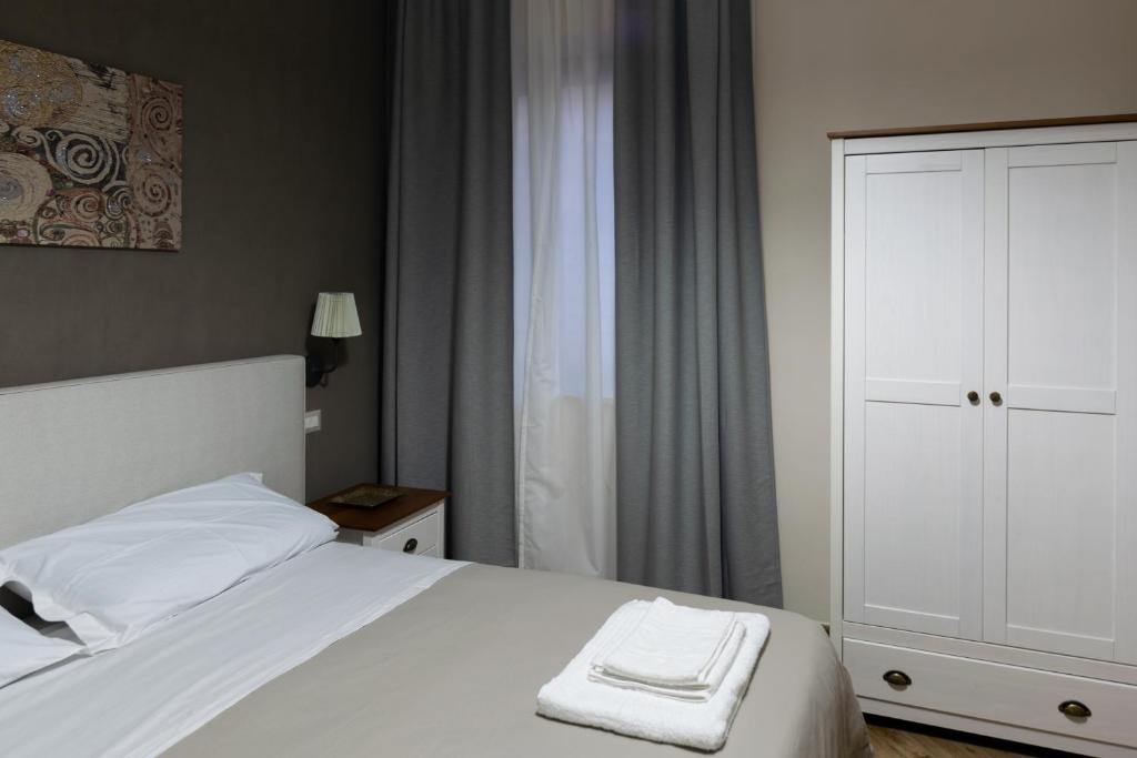 Postel nebo postele na pokoji v ubytování Apollo Bed & Breakfast
