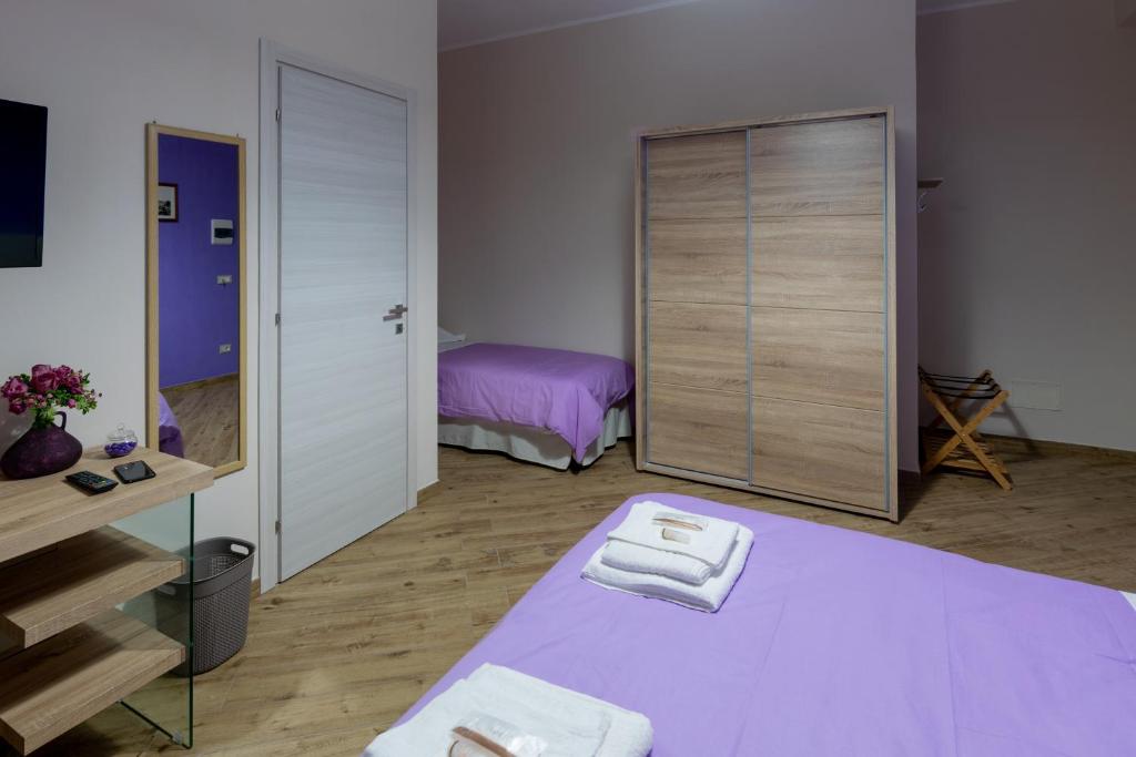 Postel nebo postele na pokoji v ubytování Apollo Bed & Breakfast
