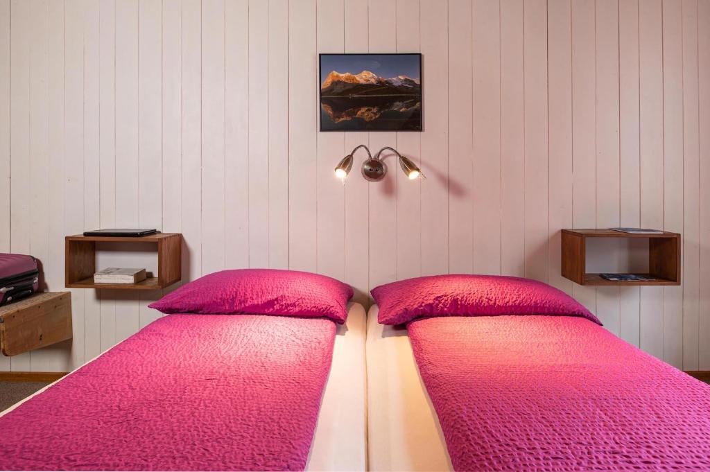 Postel nebo postele na pokoji v ubytování Hotel Alpenblick