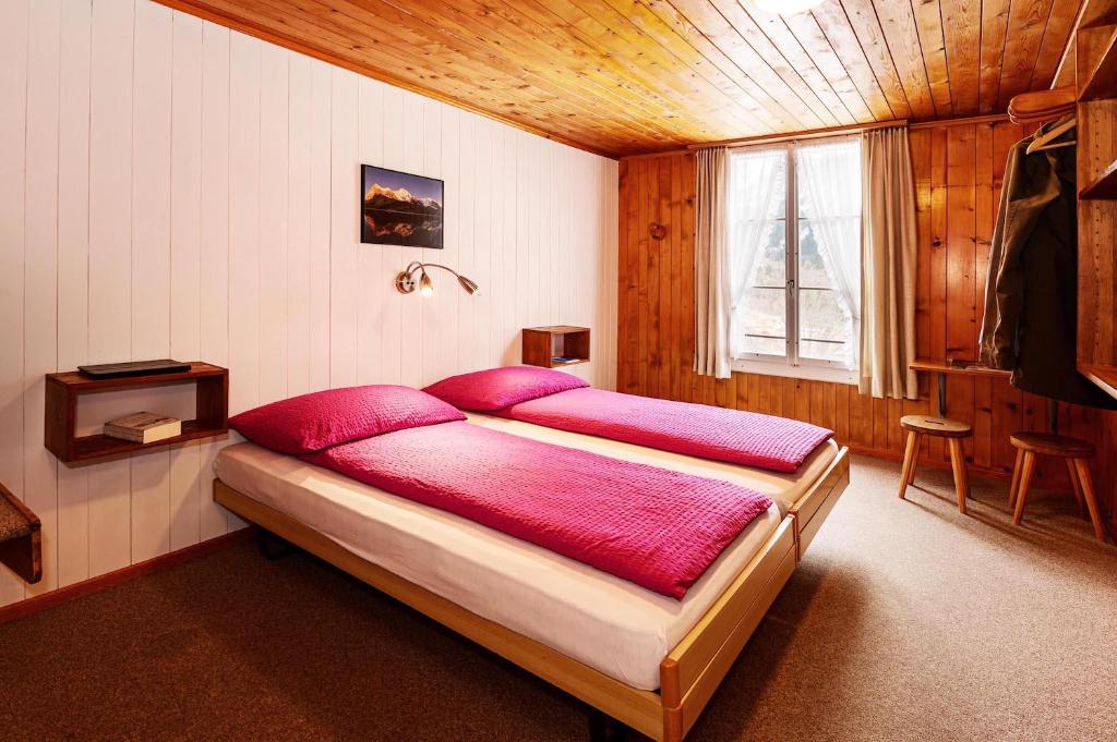 Postel nebo postele na pokoji v ubytování Hotel Alpenblick