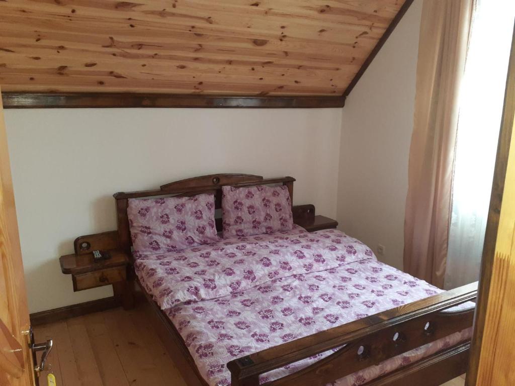 Postel nebo postele na pokoji v ubytování Соломія