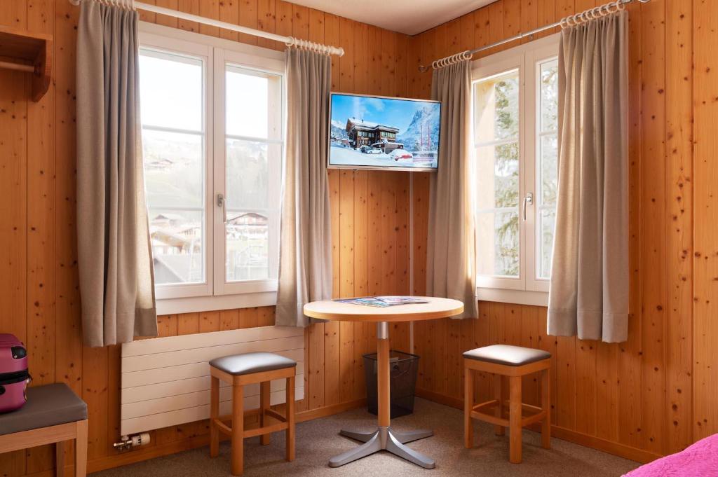 TV a/nebo společenská místnost v ubytování Hotel Alpenblick