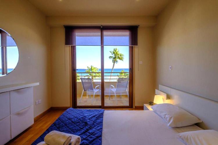 Postel nebo postele na pokoji v ubytování Les Palmiers Beach Boutique Hotel & Luxury Apartments