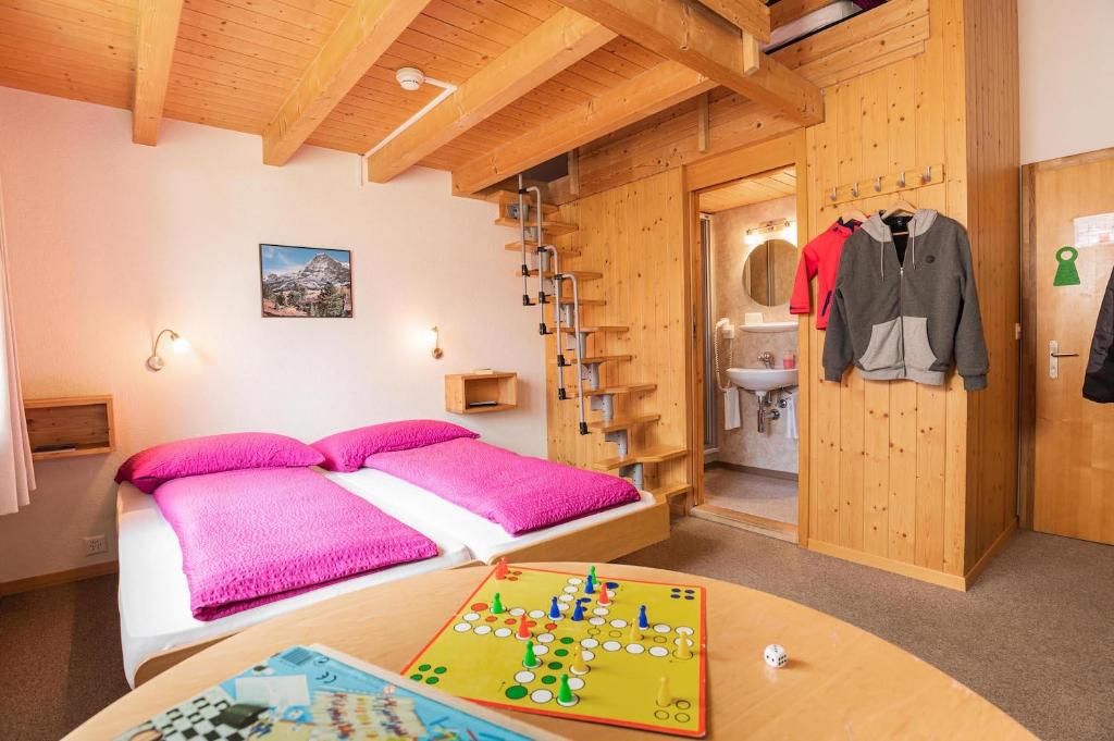 Postel nebo postele na pokoji v ubytování Hotel Alpenblick