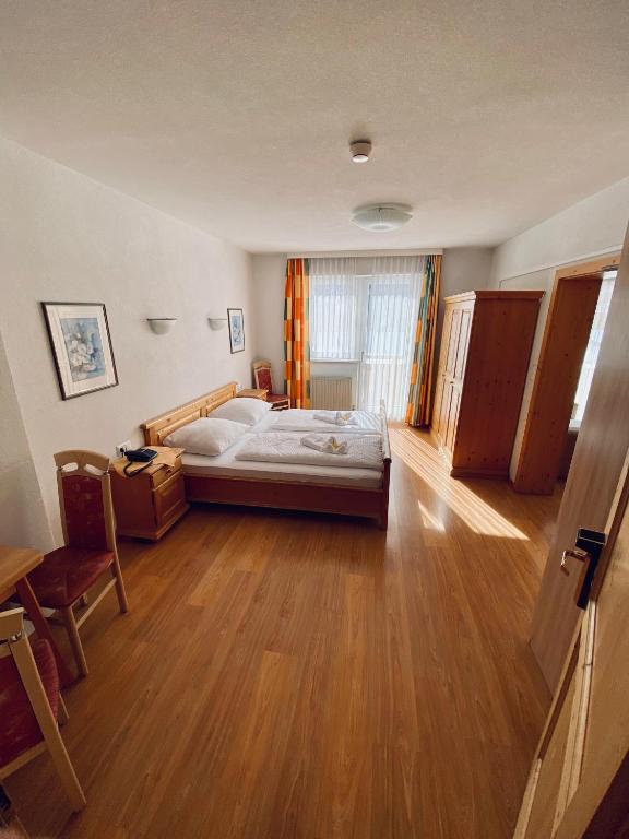 Postel nebo postele na pokoji v ubytování Hotel Kirchdach