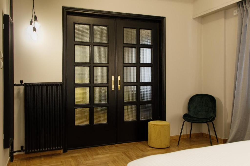 Posteľ alebo postele v izbe v ubytovaní Soho Apartments