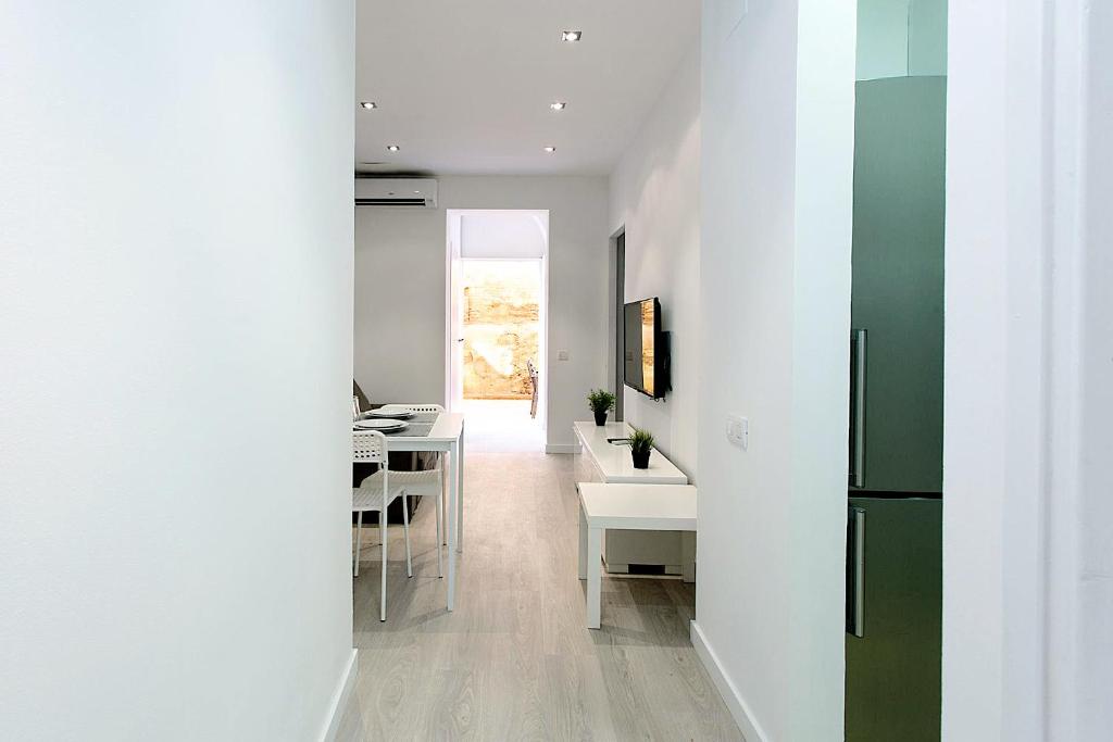 Televízia a/alebo spoločenská miestnosť v ubytovaní MA22 · MA22 - Apartment in Sants communal terrace