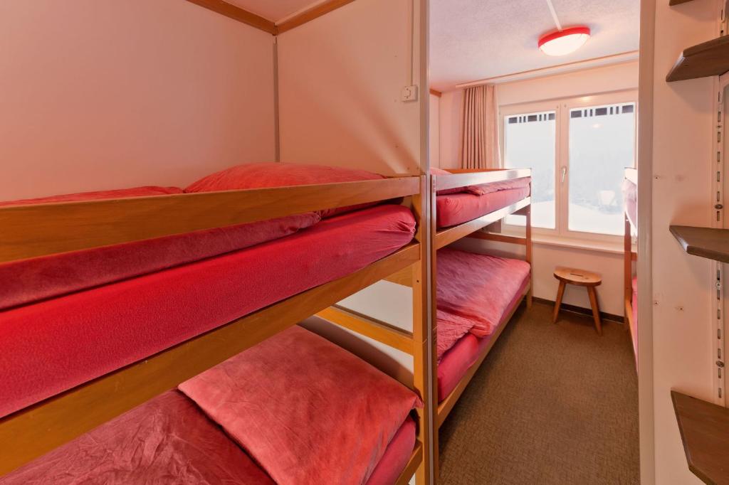 Postel nebo postele na pokoji v ubytování Hotel Alpenblick