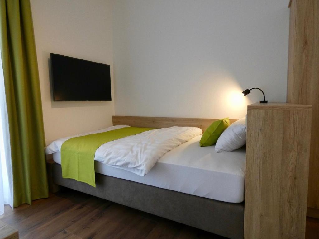 Postel nebo postele na pokoji v ubytování Living Hallertau