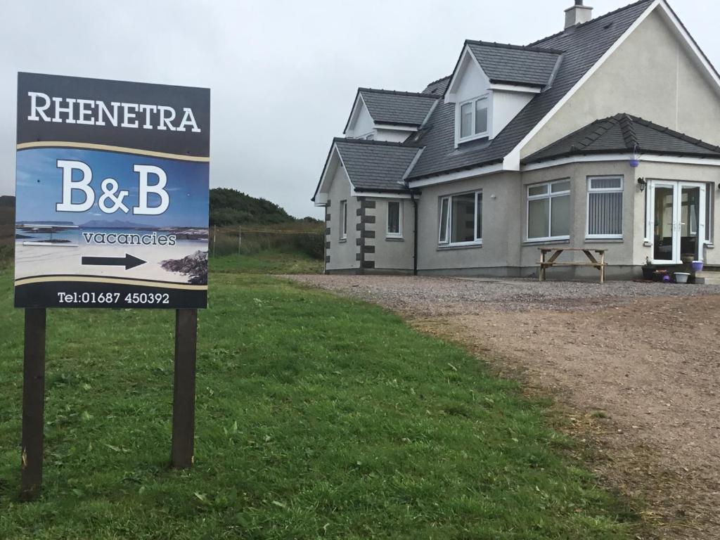 a sign in front of a house at Rhenetra in Arisaig