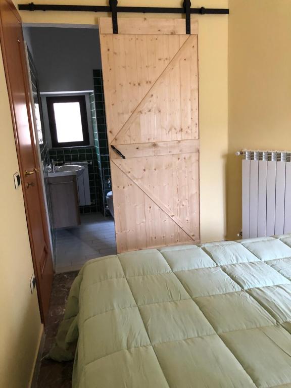 Postel nebo postele na pokoji v ubytování Ka suporti