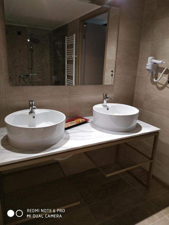 Koupelna v ubytování Hotel Koferita