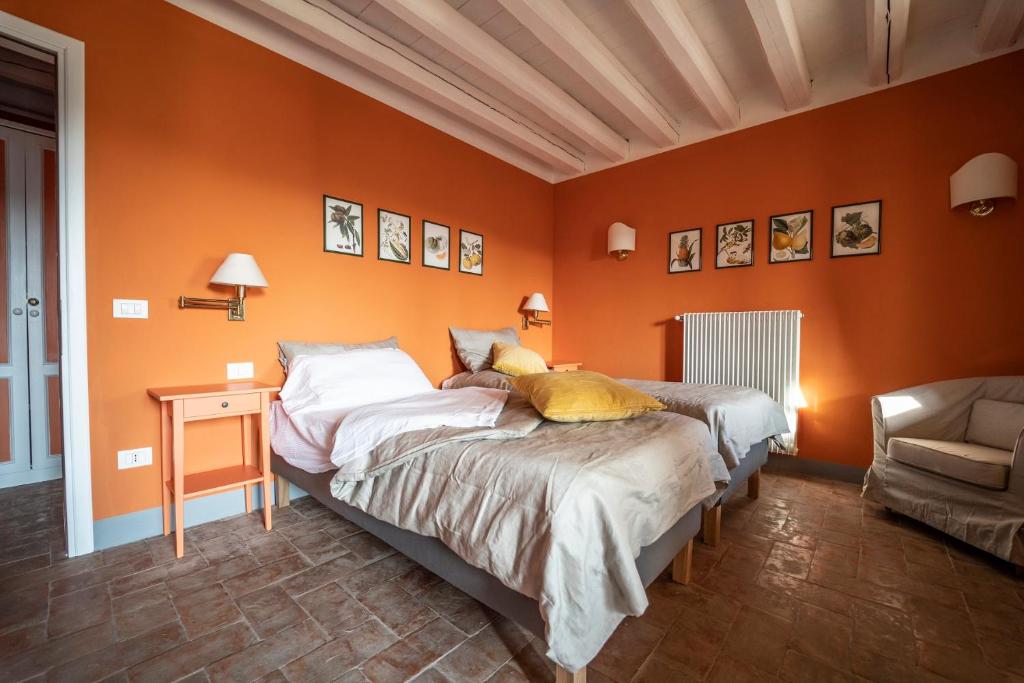 Postel nebo postele na pokoji v ubytování Foresteria San Rocco Borgoluce