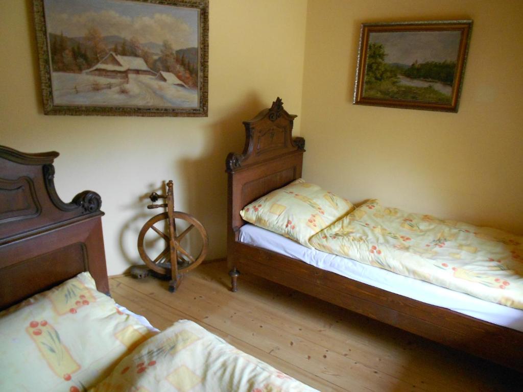 Postel nebo postele na pokoji v ubytování Apartmány Na Lontě