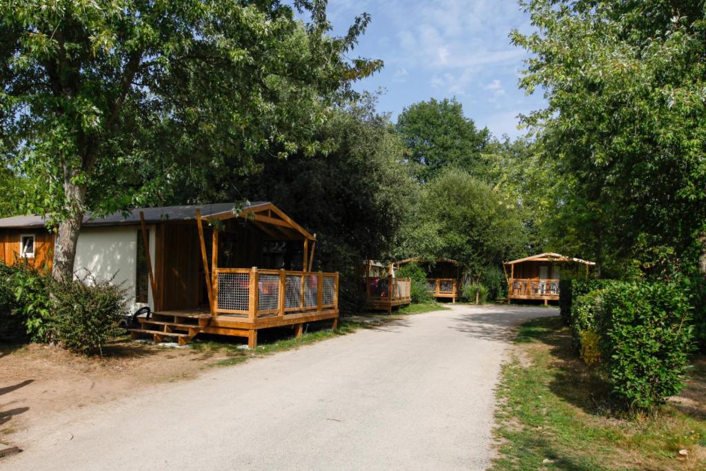 a road with some huts on the side at Camping Capfun La Bretèche in Les Épesses