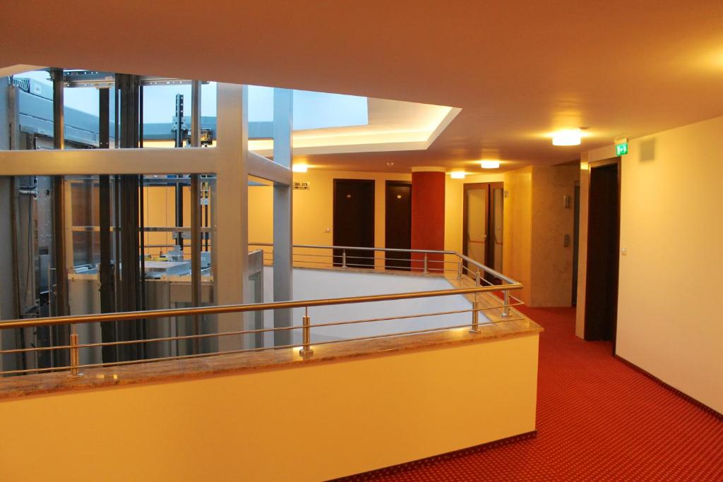 Postel nebo postele na pokoji v ubytování Hotel Carpați