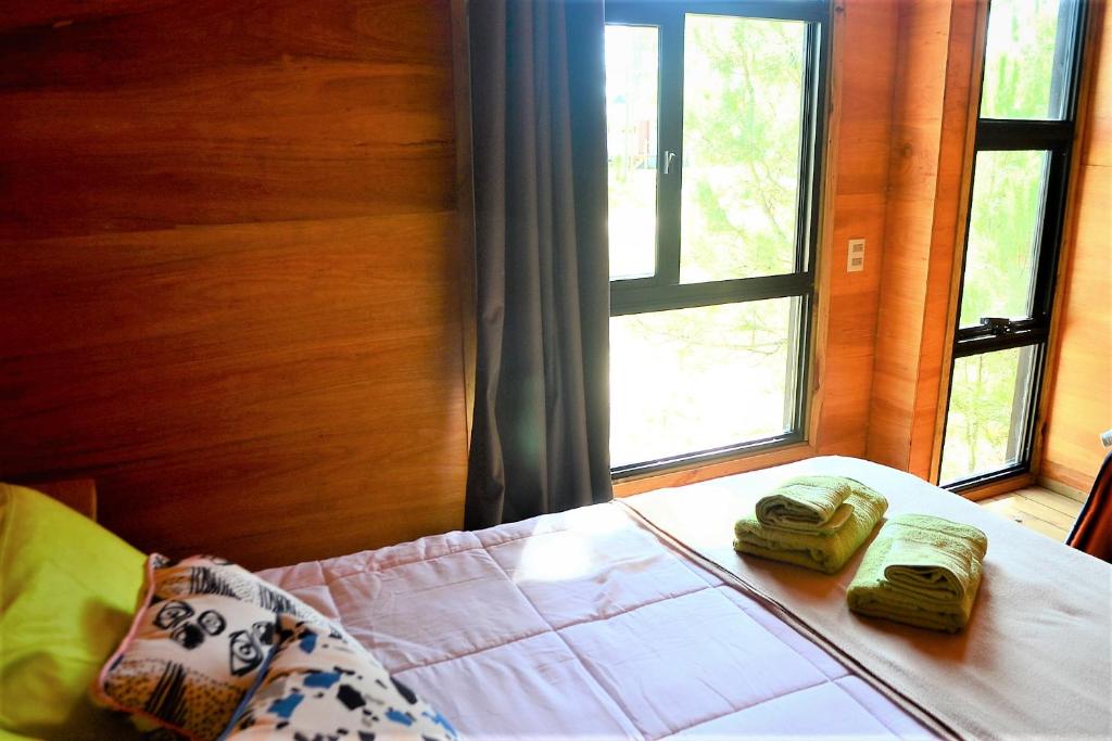 Postel nebo postele na pokoji v ubytování El cabañon del cuervo