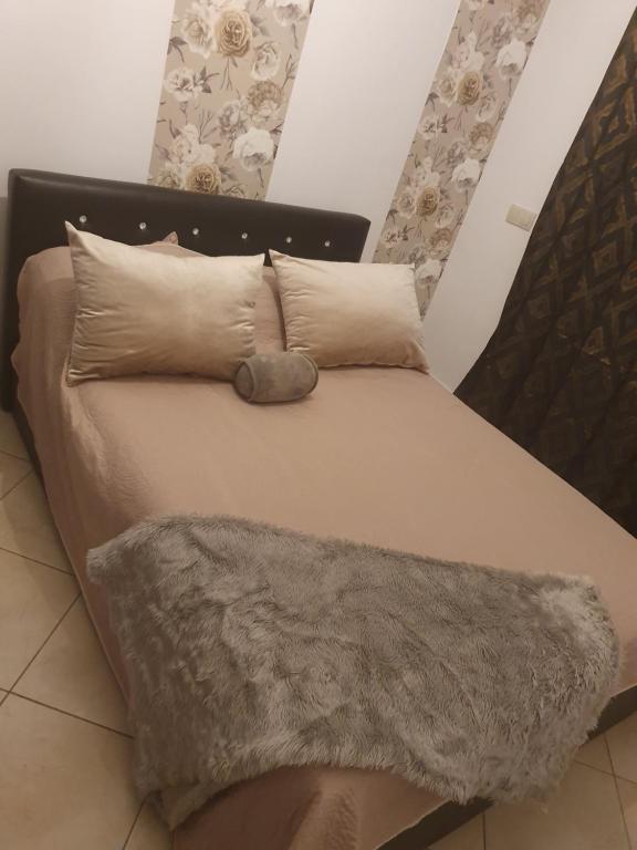 Postel nebo postele na pokoji v ubytování Appartement avec piscine, 1min de la plage