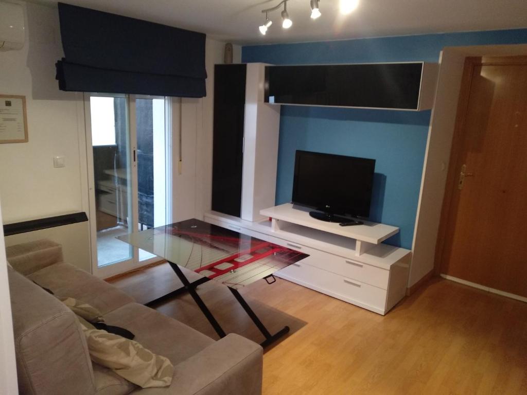A television and/or entertainment centre at El Patio