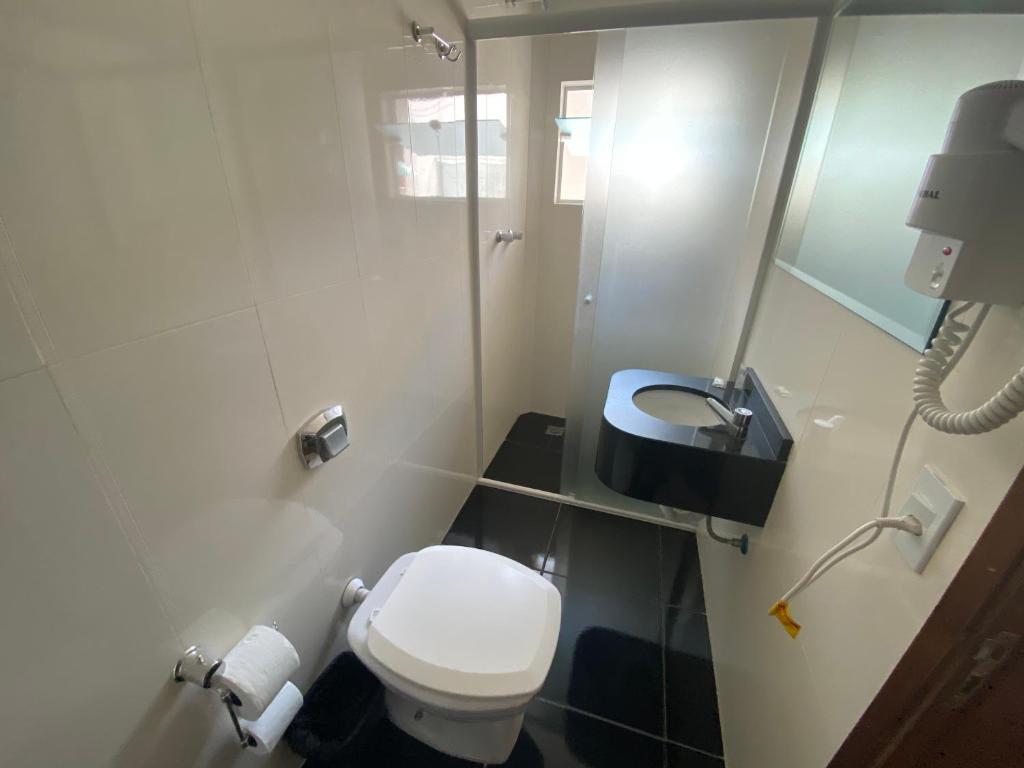 Koupelna v ubytování Mayná Hotel Prudentópolis Centro