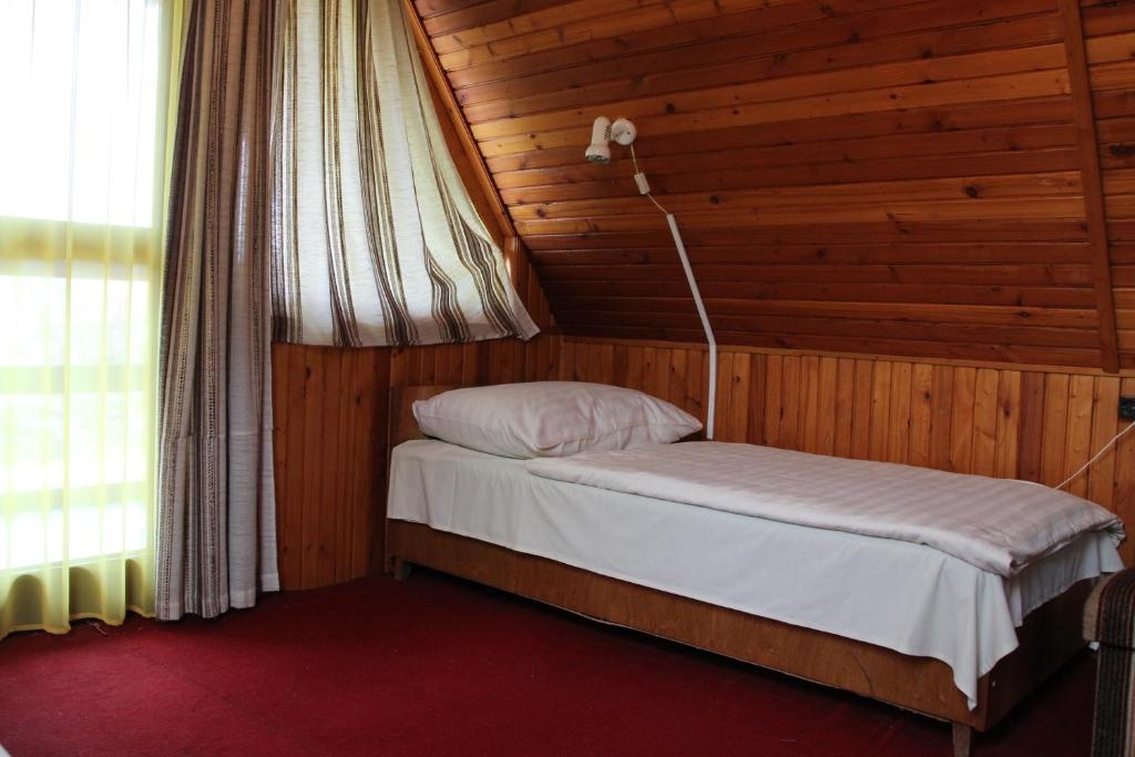 Postel nebo postele na pokoji v ubytování Fülöp Vendégház