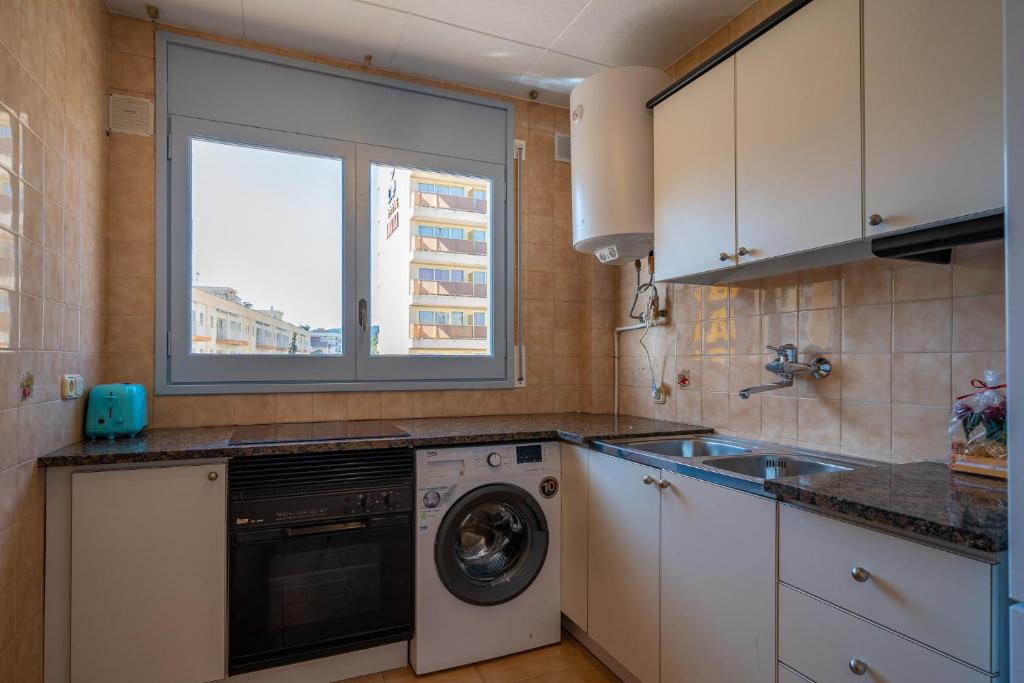 Kuchyň nebo kuchyňský kout v ubytování HomeHolidaysRentals Elodie