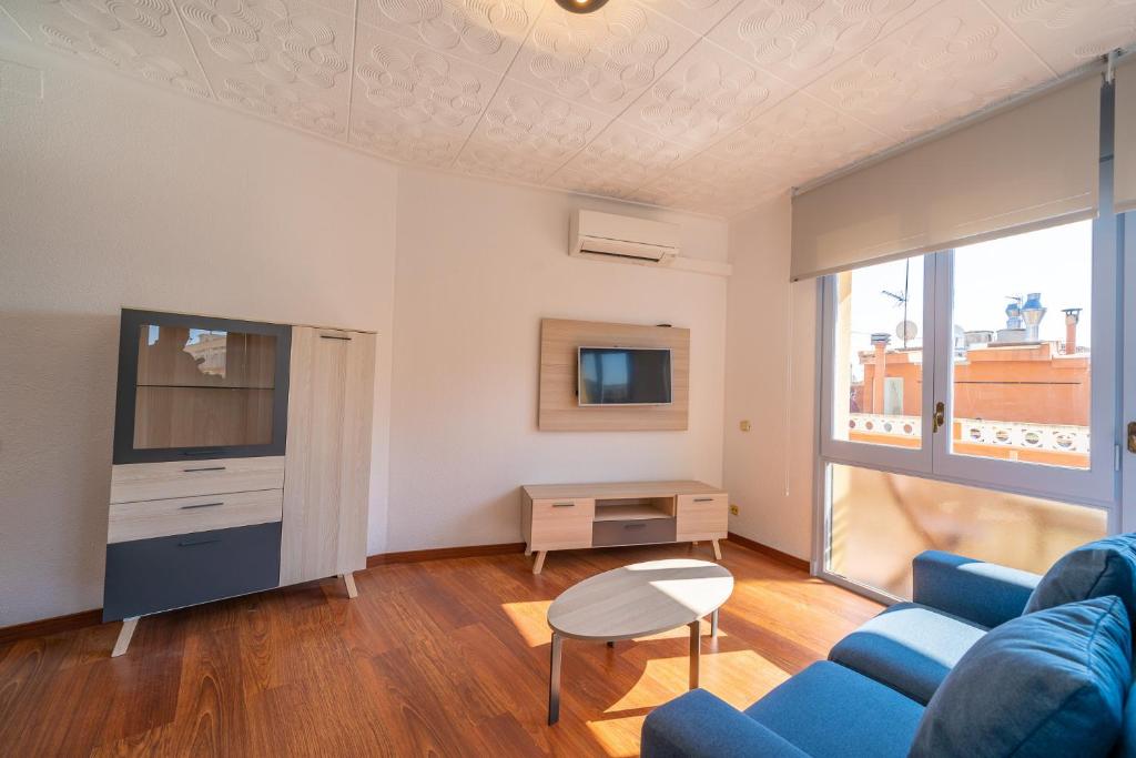 TV a/nebo společenská místnost v ubytování HomeHolidaysRentals Elodie