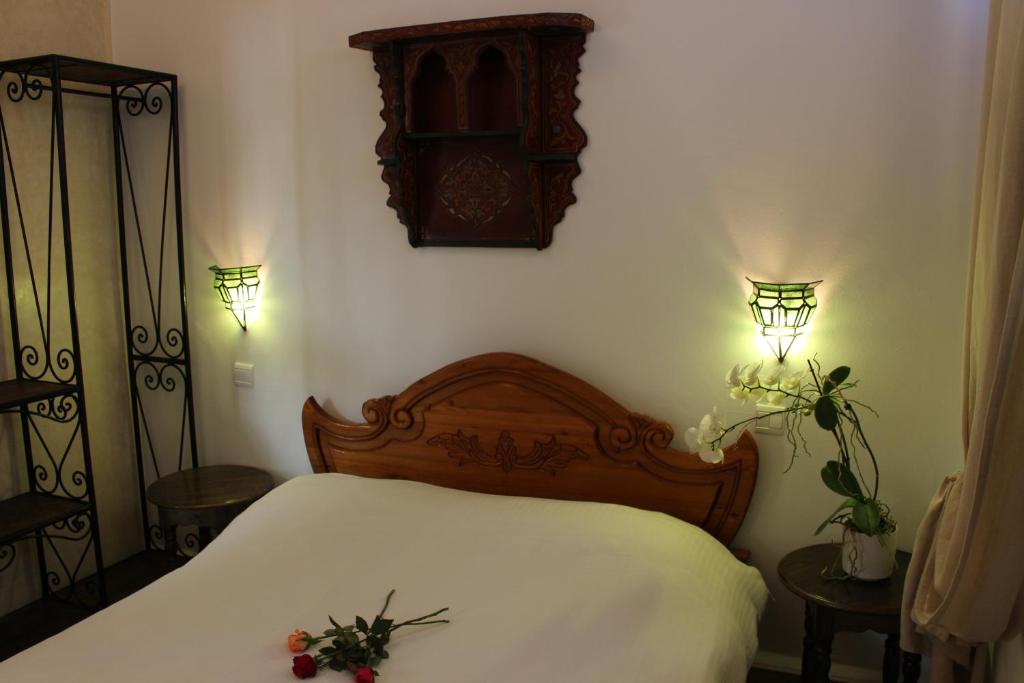Letto o letti in una camera di Riad Salmiya Dune