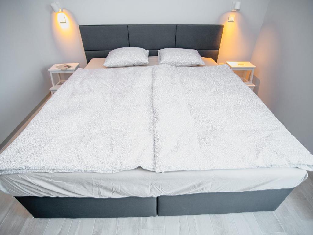 Posteľ alebo postele v izbe v ubytovaní Modern Comfort Amidst Nature