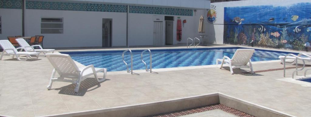 Bazén v ubytování Hotel Mar del Plata nebo v jeho okolí
