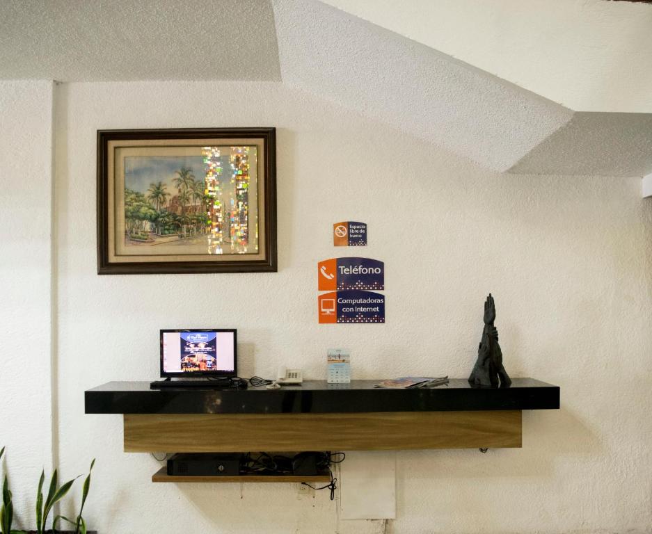 TV a/nebo společenská místnost v ubytování Howard Johnson by Wyndham Veracruz
