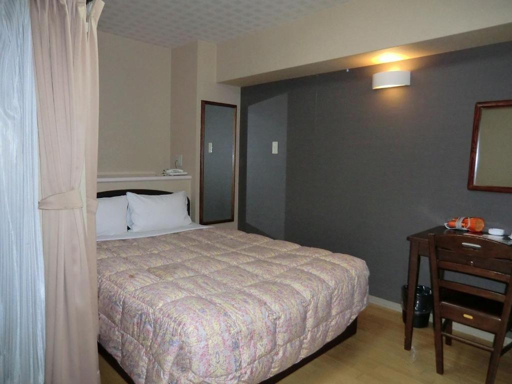 Ліжко або ліжка в номері Azu garden Nippombashi / Vacation STAY 74145