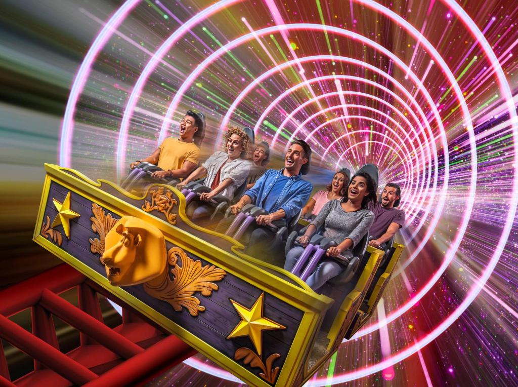 a group of people riding on a roller coaster at Park Inn by Radisson Abu Dhabi Yas Island in Abu Dhabi
