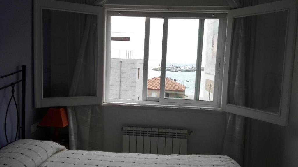 Posteľ alebo postele v izbe v ubytovaní planta alta en casa