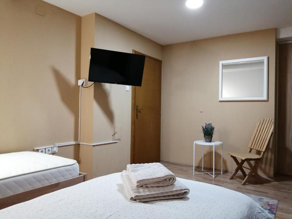 Postel nebo postele na pokoji v ubytování Apartmani Milošević