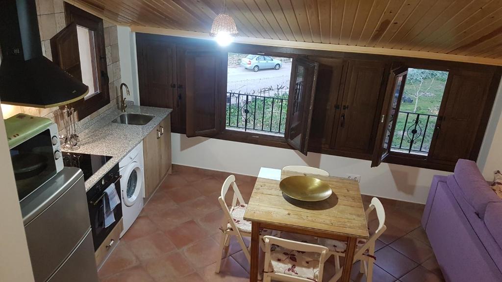 Kuchyň nebo kuchyňský kout v ubytování Apartamentos Plan Dulcis
