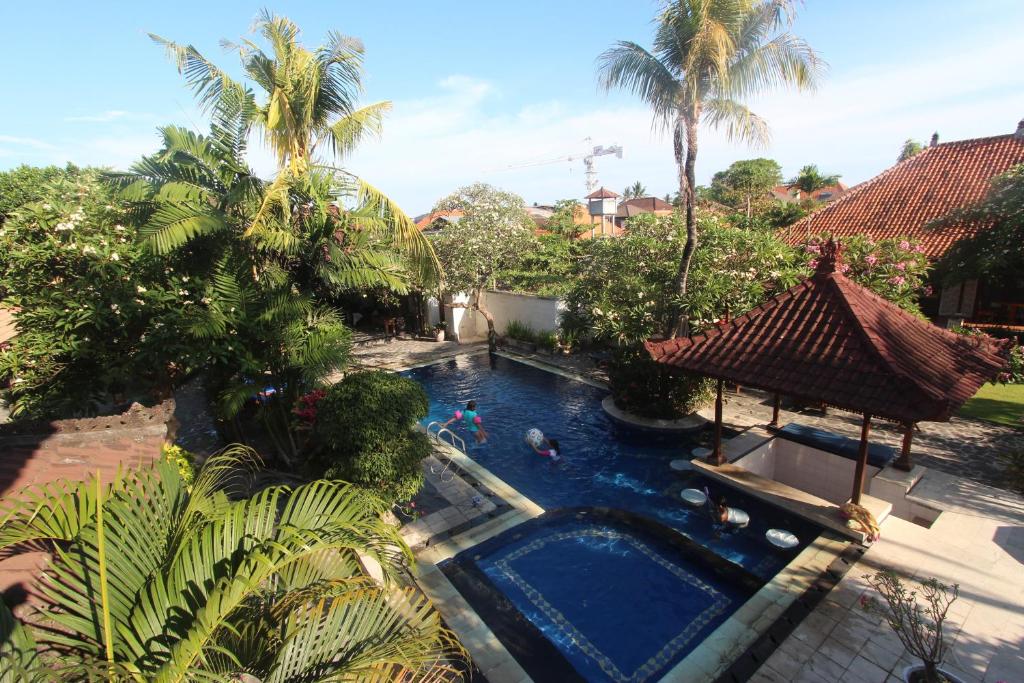 an overhead view of a swimming pool in a house at Taman Agung Hotel in Sanur