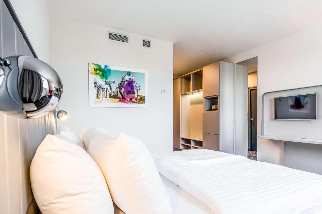 Televízia a/alebo spoločenská miestnosť v ubytovaní Park Inn by Radisson Danube Bratislava