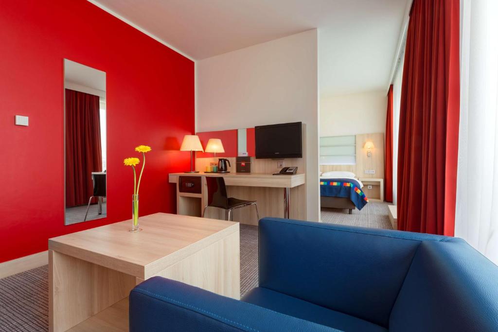 TV a/nebo společenská místnost v ubytování Park Inn by Radisson Linz