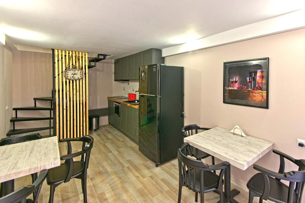 Kuchyň nebo kuchyňský kout v ubytování Sakhli at Chavchavadze ave 15