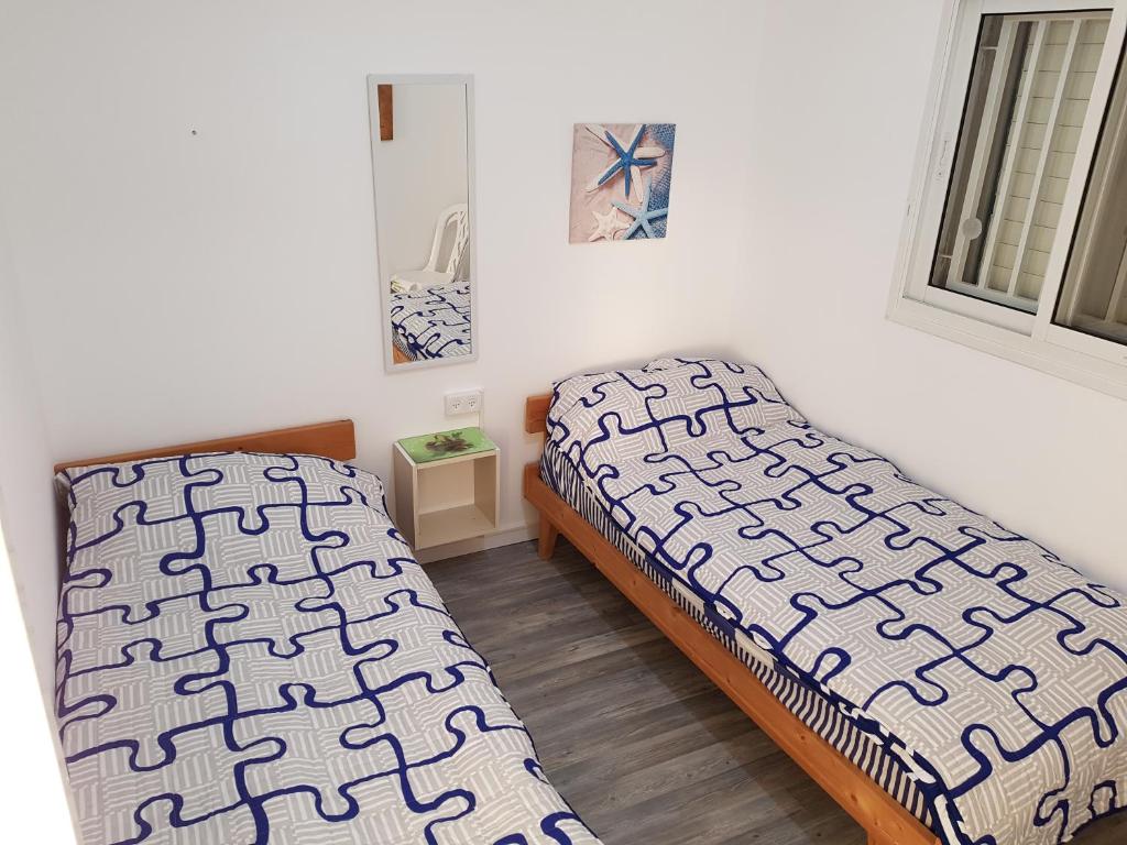 Postel nebo postele na pokoji v ubytování Nazareth View