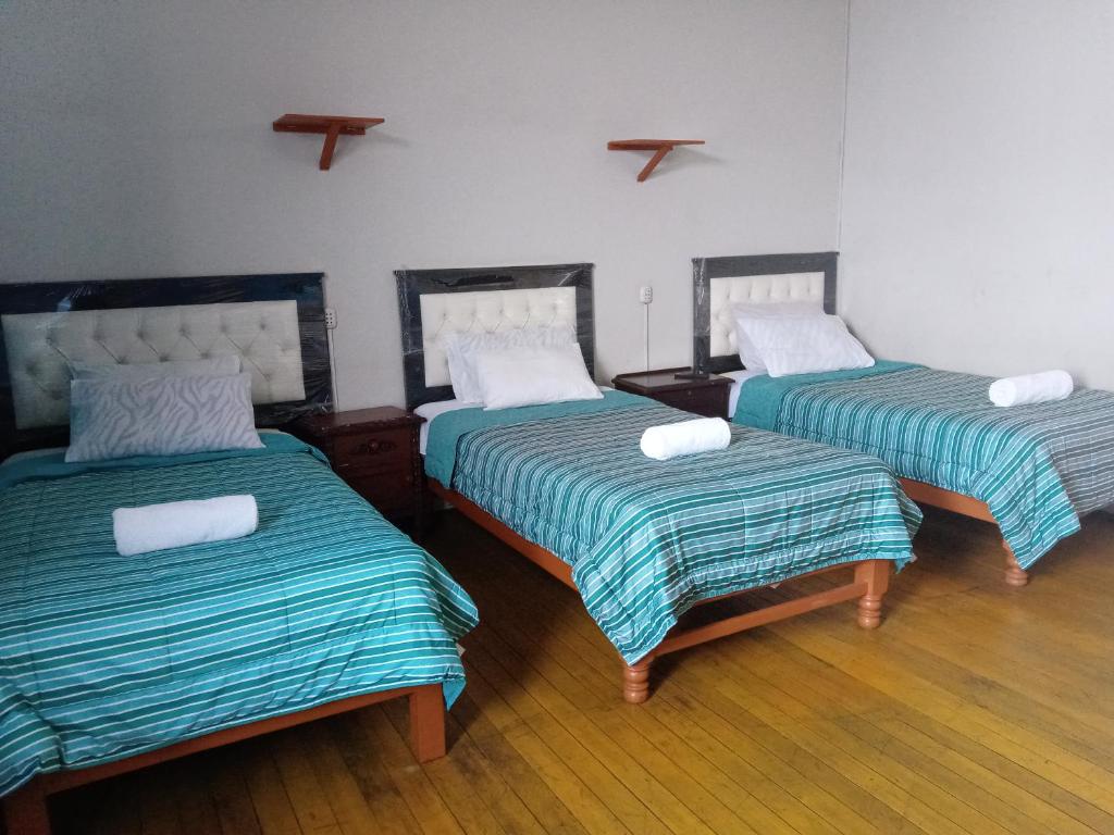 Postel nebo postele na pokoji v ubytování Misti Hostel B&B