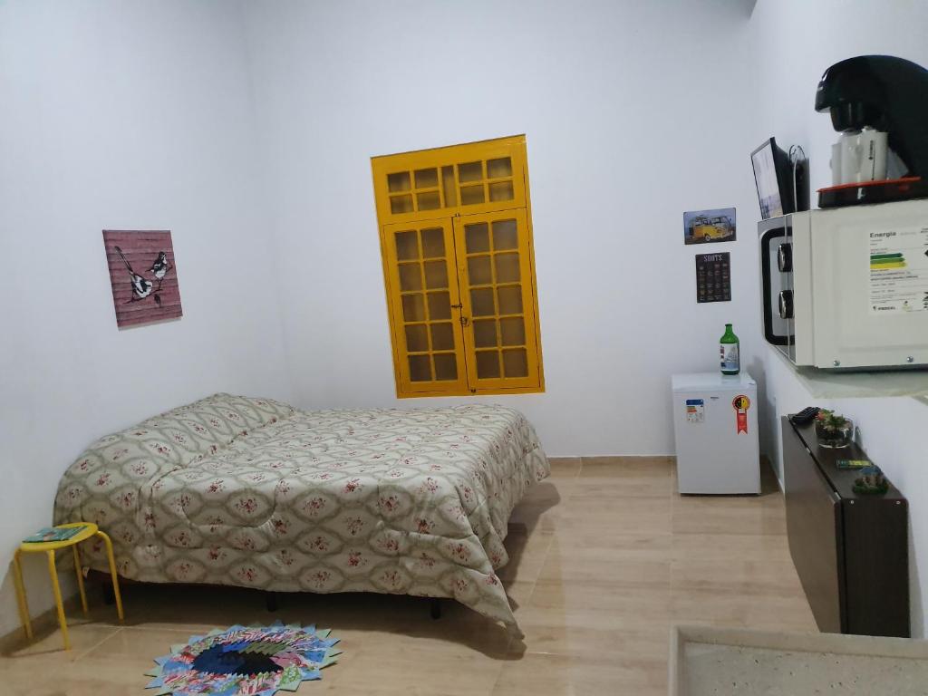 Postel nebo postele na pokoji v ubytování Sitio Aconchego Verde Guararema