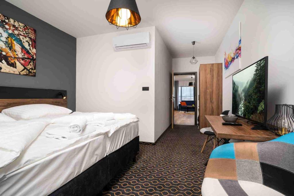 TV a/nebo společenská místnost v ubytování Hotel Mamut
