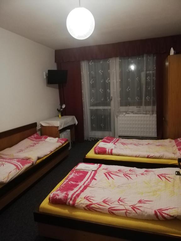 Postel nebo postele na pokoji v ubytování ABC Hotel Nitra